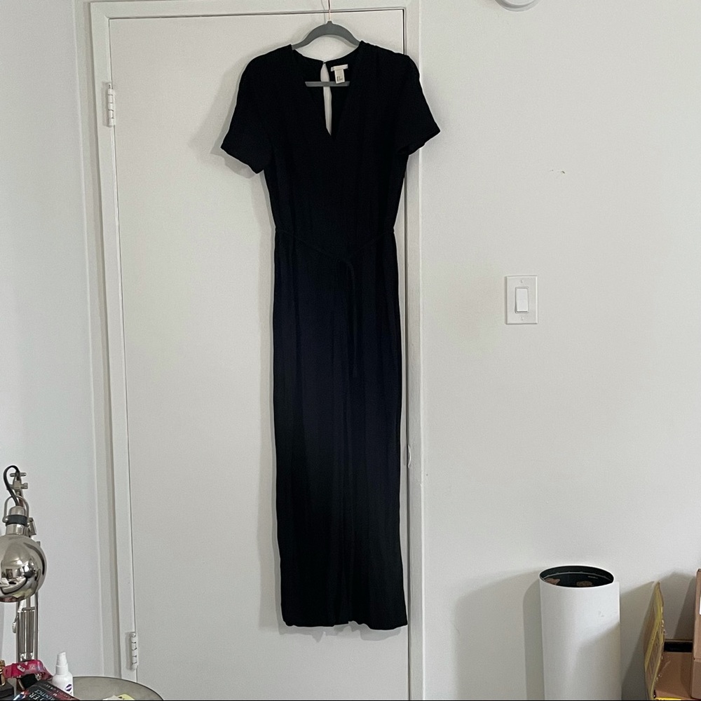 Black viscose jumpsuit with tie. Size 6